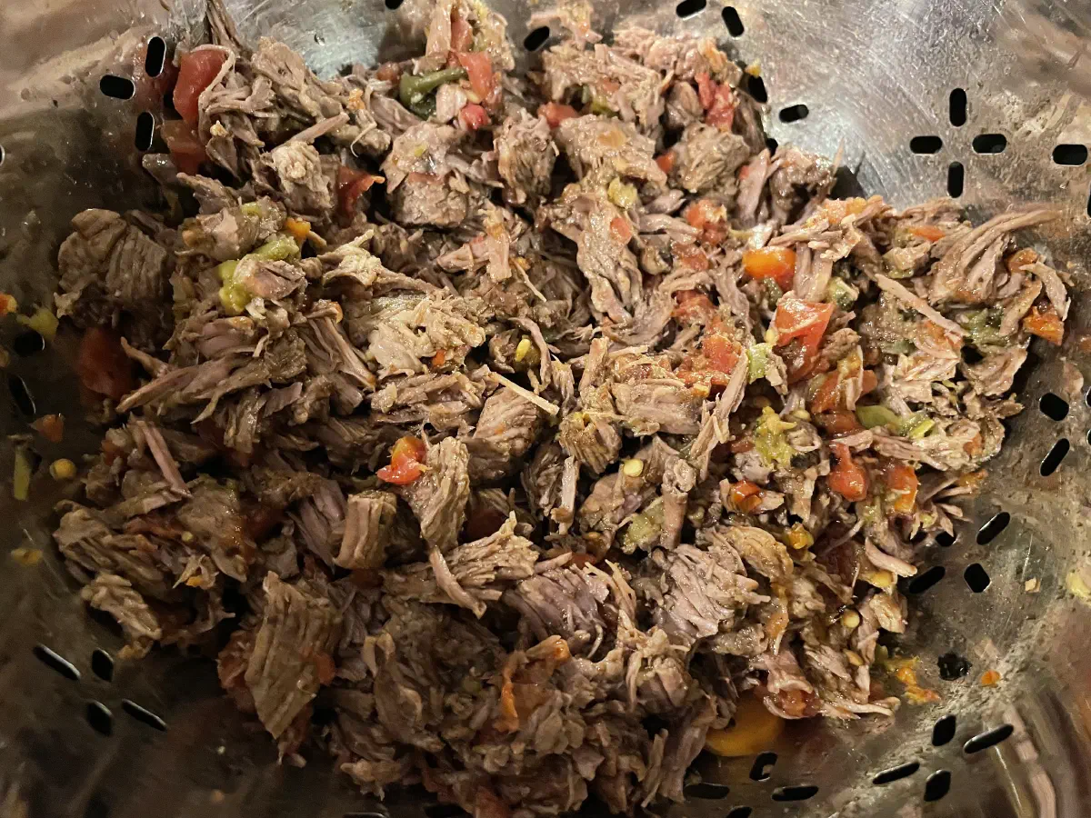 Shredded and strained meat